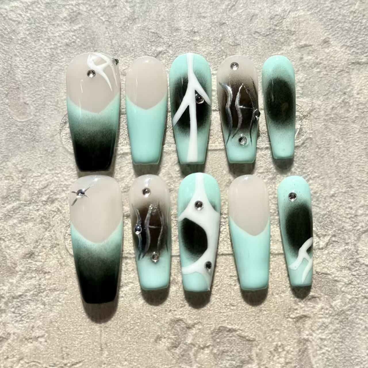 Mint Eclipse – Coffin Press-On Nails with Abstract Black Gradient, White Lines & Rhinestone Accents