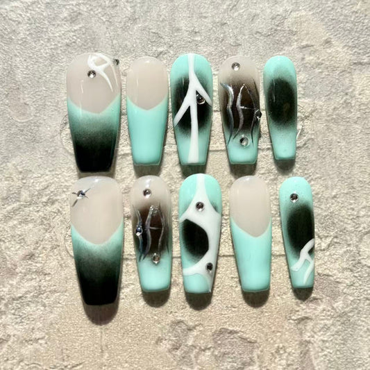 Mint Eclipse – Coffin Press-On Nails with Abstract Black Gradient, White Lines & Rhinestone Accents