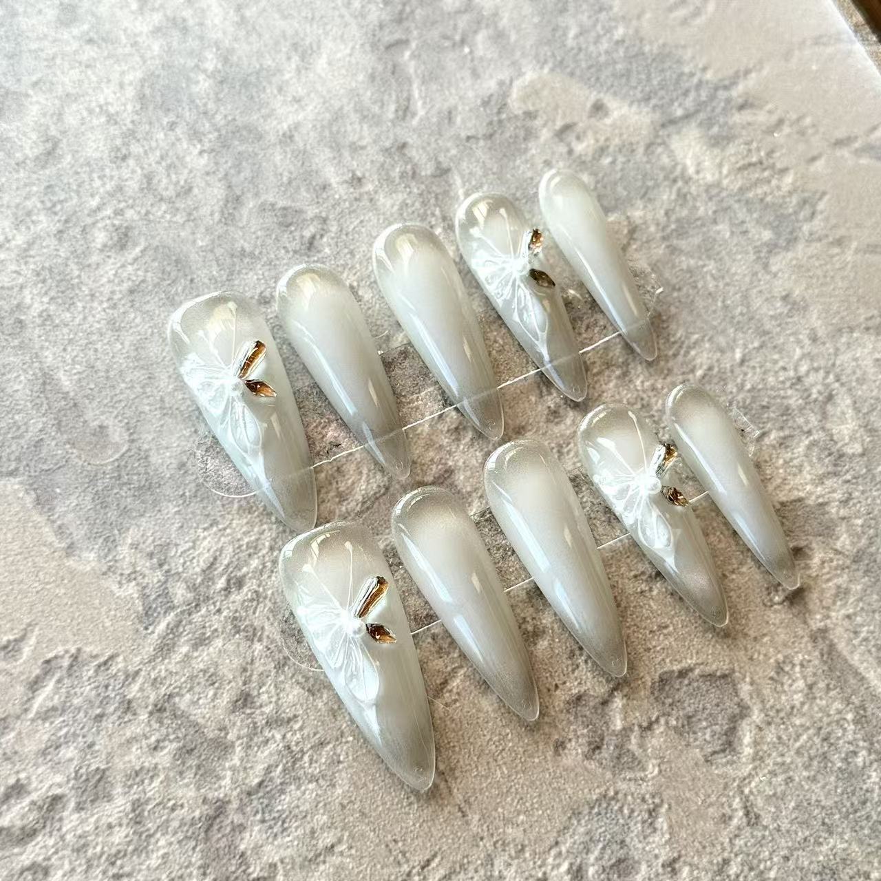 Ivory Lueur – Pearl Ombre Luxury Press-On Nails with 3D Bow & Golden Crystal Accent