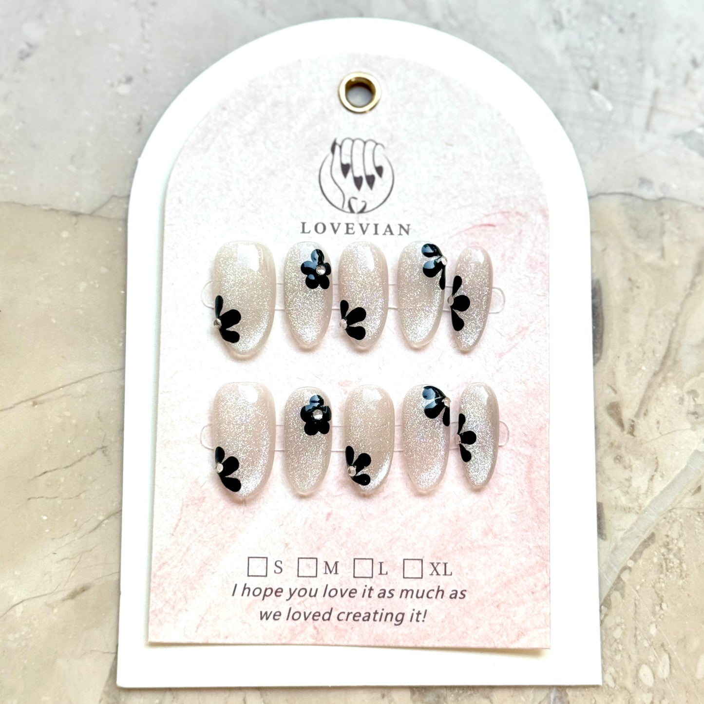 Noir Daisy – Silver Glitter Press-On Nails with Black Floral Design