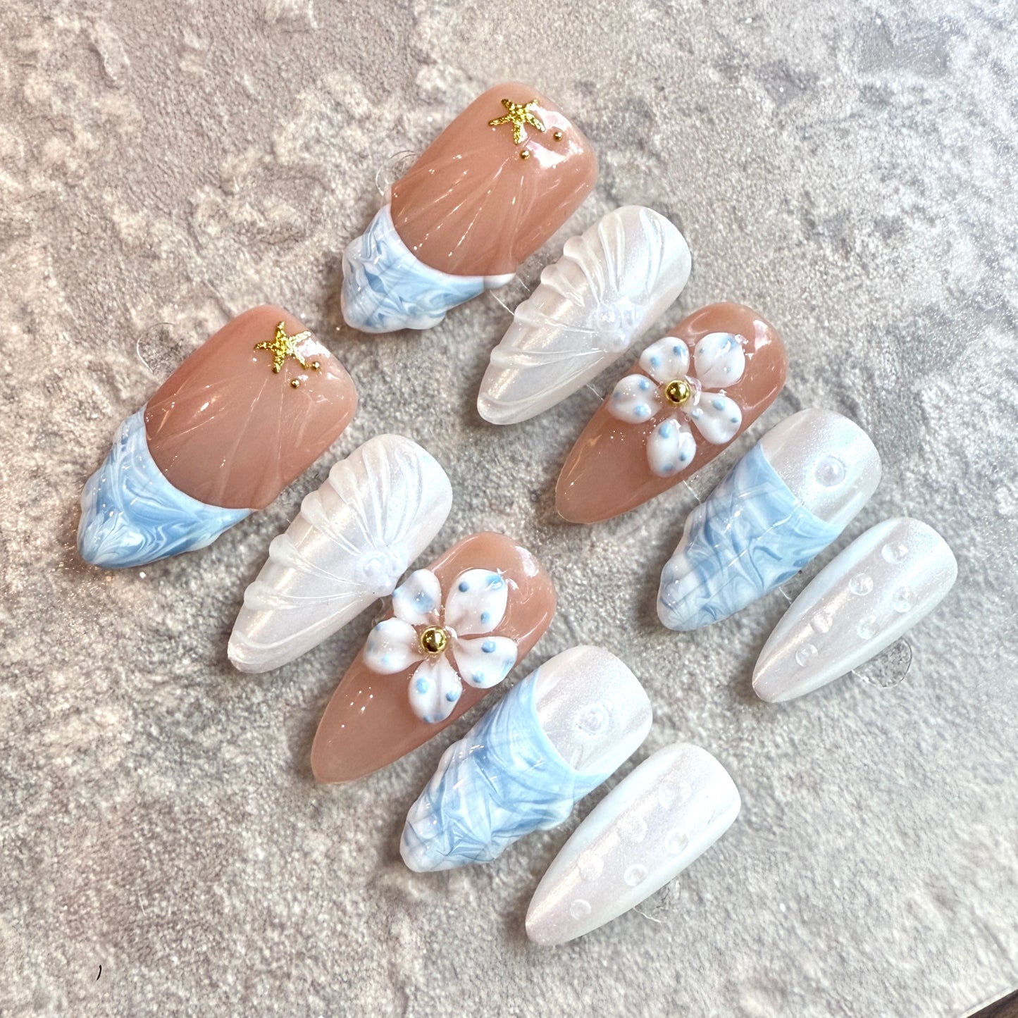Ocean Breeze – Coastal Nude & Blue Marble Press-On Nails with 3D Flowers and Starfish Accents