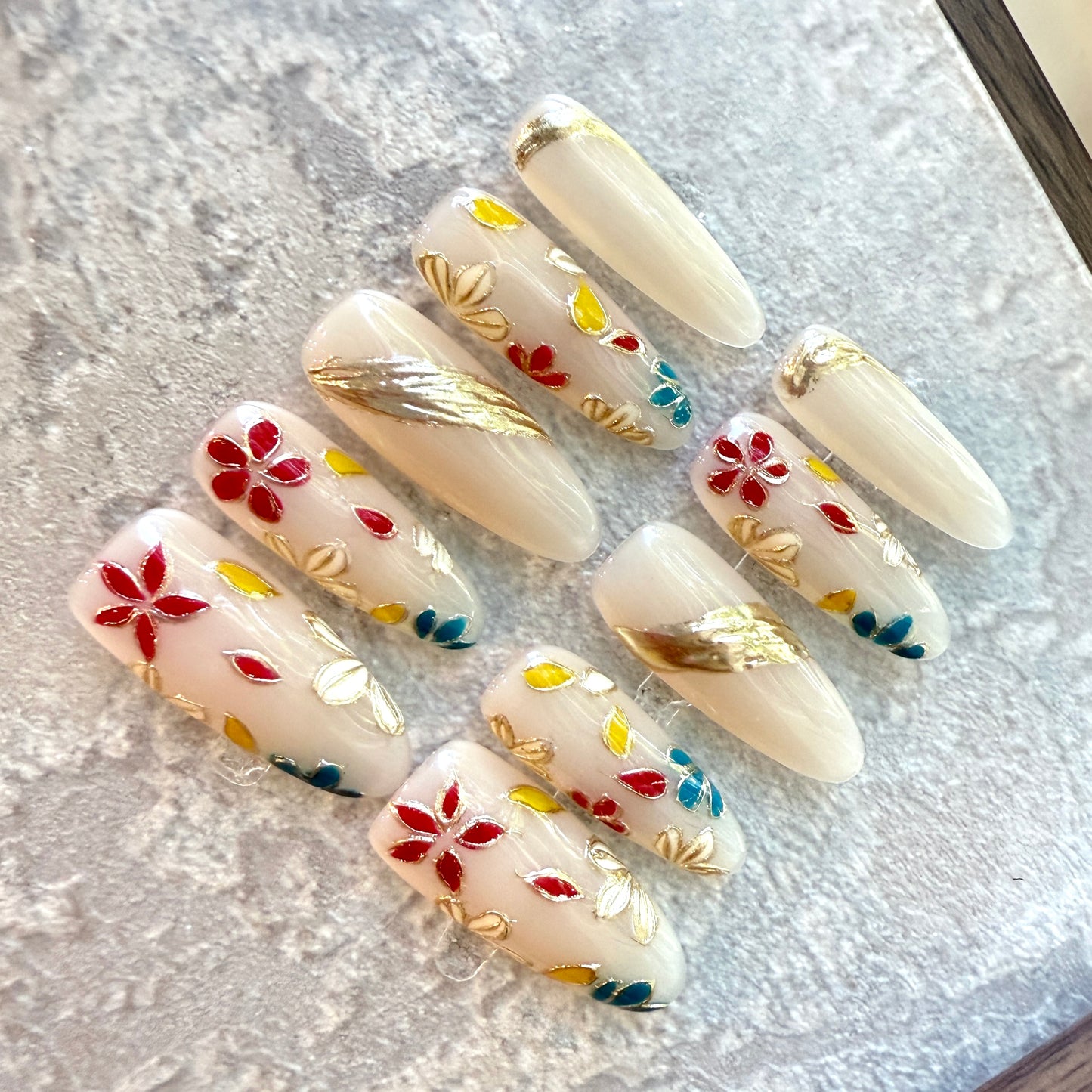 Enamel Blossom – Long oval Press-On Nails with Red & Blue Floral Design & Gold Accents