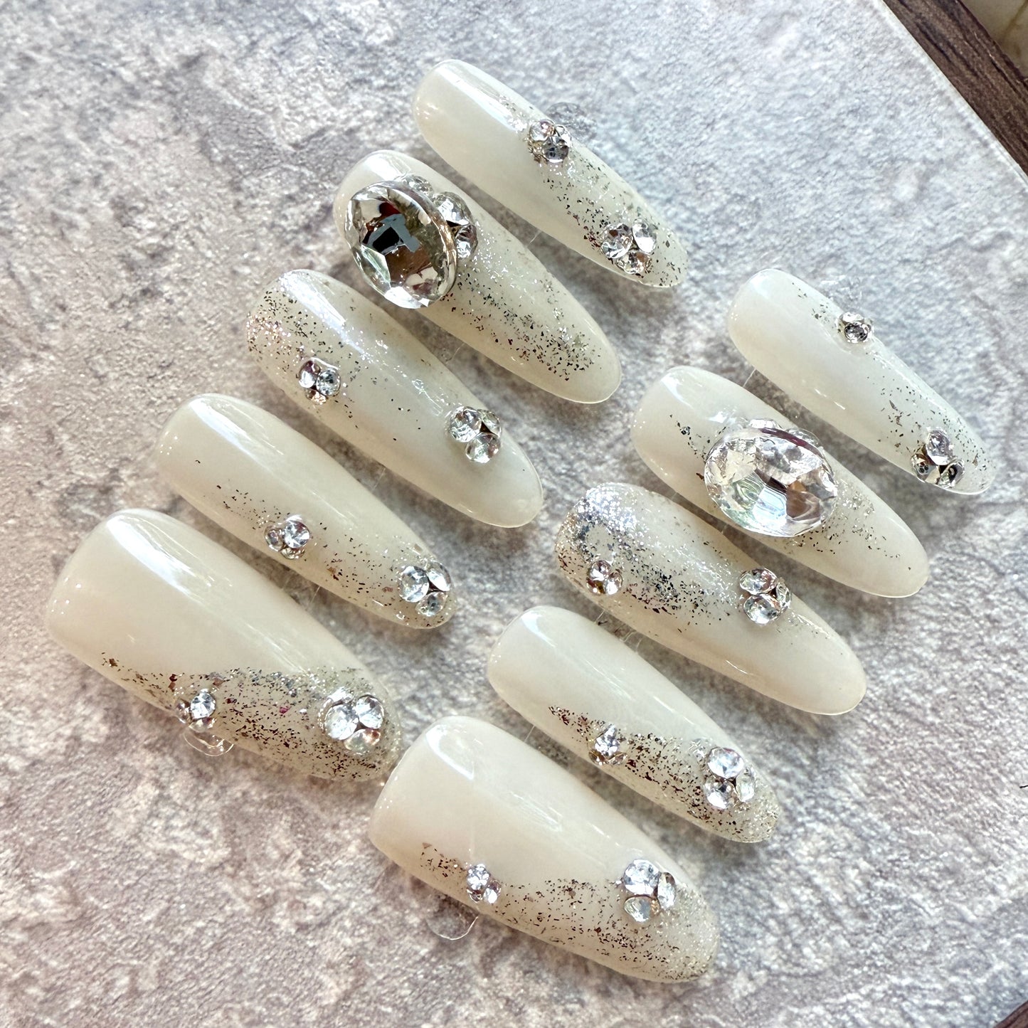 Crystal Glam Press-On Nails – Coffin Shape, White Nude Base with Silver Glitter & 3D Rhinestones