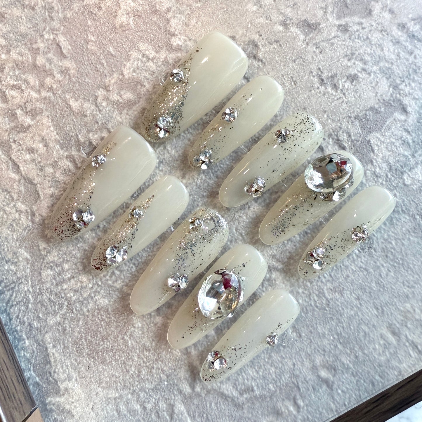 Crystal Glam Press-On Nails – Coffin Shape, White Nude Base with Silver Glitter & 3D Rhinestones