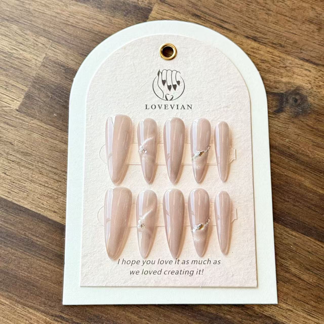 Pearl Nude Elegance – Stiletto Press-On Nails with Nude Cat-Eye Shine & Minimalist Gem Accents