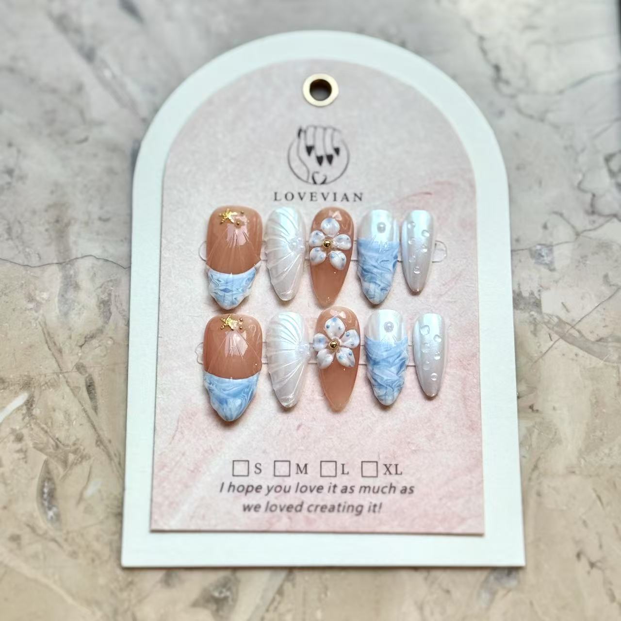 Ocean Breeze – Coastal Nude & Blue Marble Press-On Nails with 3D Flowers and Starfish Accents