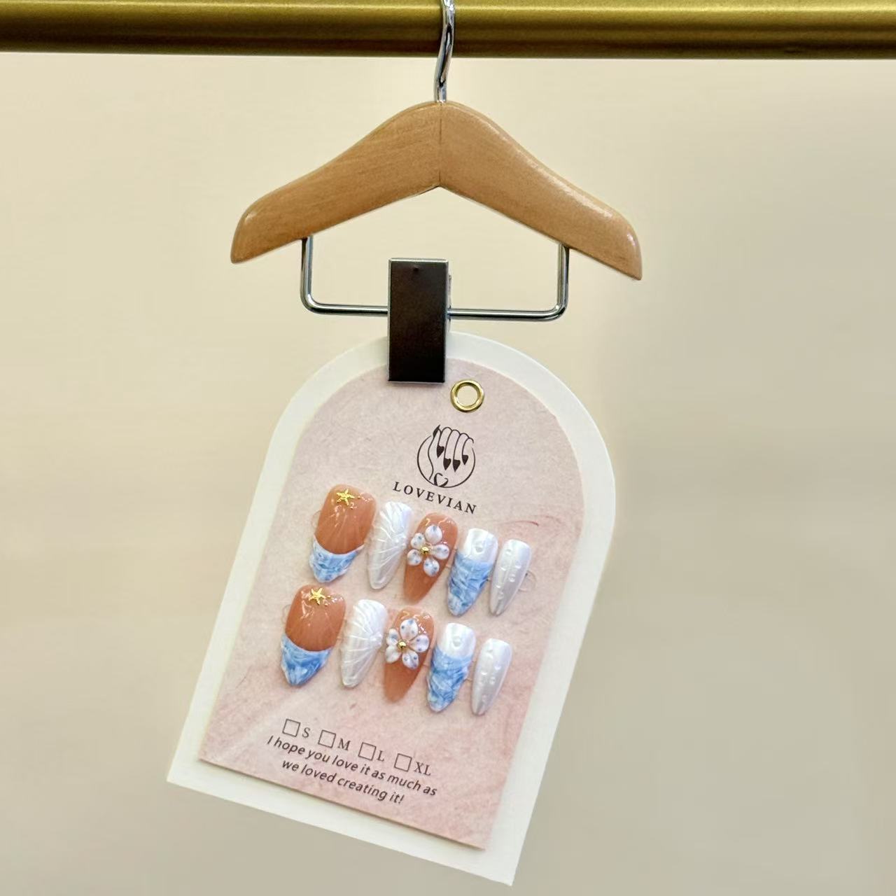 Ocean Breeze – Coastal Nude & Blue Marble Press-On Nails with 3D Flowers and Starfish Accents