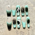 Mint Eclipse – Coffin Press-On Nails with Abstract Black Gradient, White Lines & Rhinestone Accents