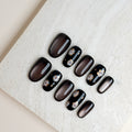 Noir Daisy Short Oval Press-On Nails – Black Floral Handmade Nails