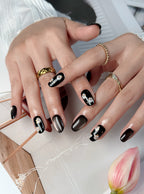 Noir Daisy Short Oval Press-On Nails – Black Floral Handmade Nails