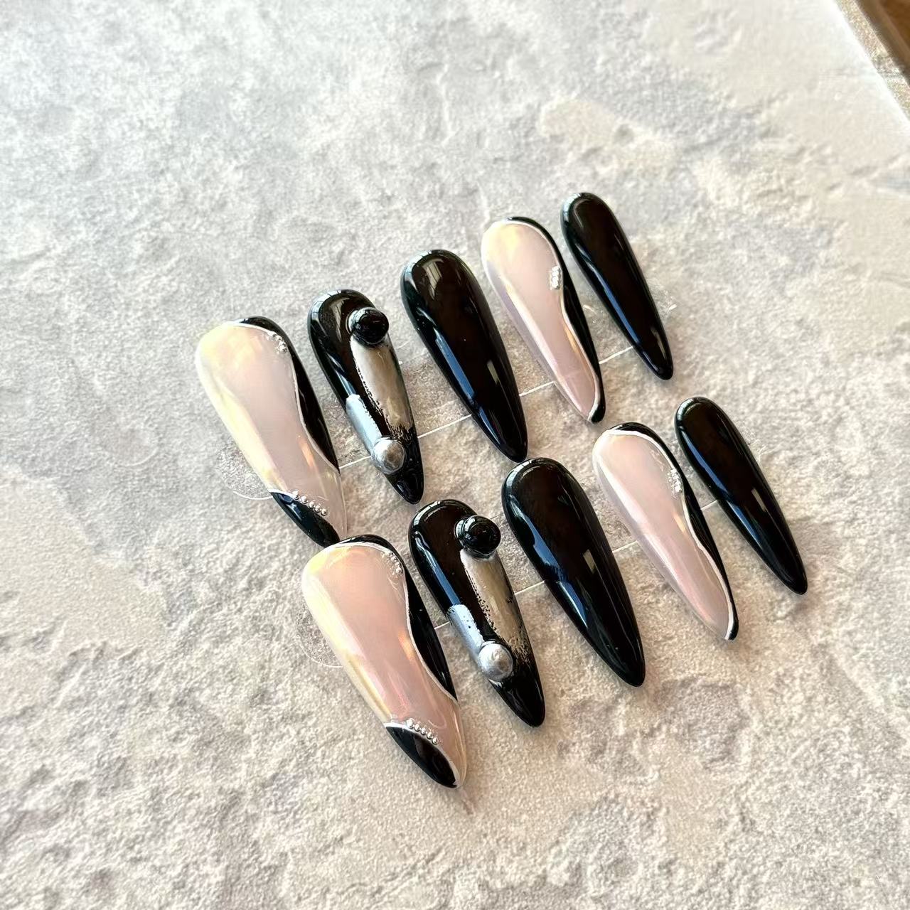 Noir Éclipse – Black & Nude Luxury Press-On Nails with Metallic Orbs