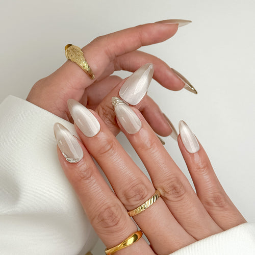 Champagne Gild medium almond handmade press-on nails with champagne gold French tips