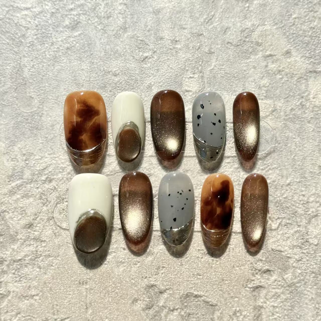 Amber Stone Elegance – Oval Press-On Nails with Brown Marble, Grey Ink & Silver Accents