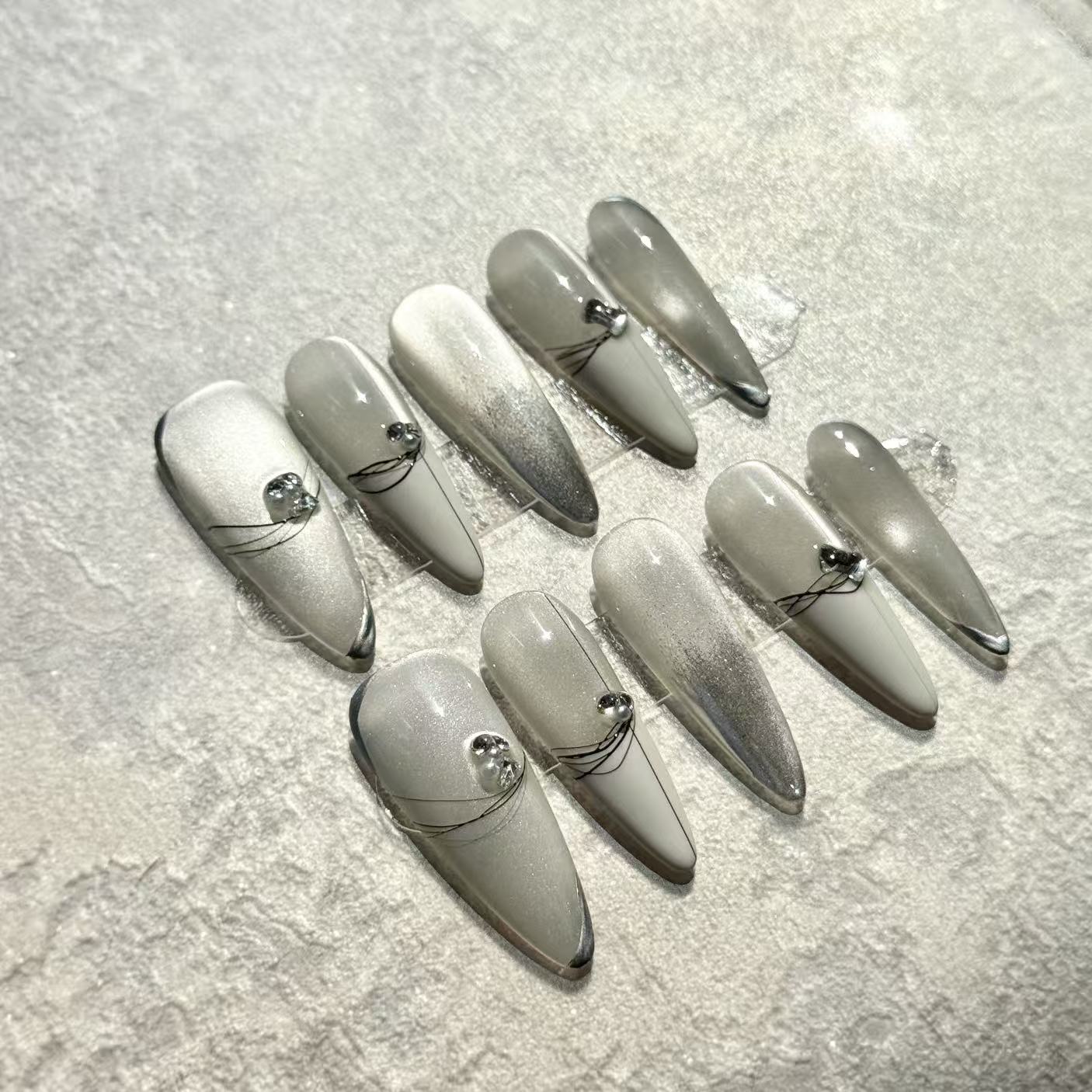 Glacier Shine – Stiletto Press-On Nails with Silver Cat-Eye, White Ombre & Crystal Accents