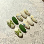 Spring Garden – Oval Press-On Nails with Green Clover, Floral Hand-Paint & Pastel Accents