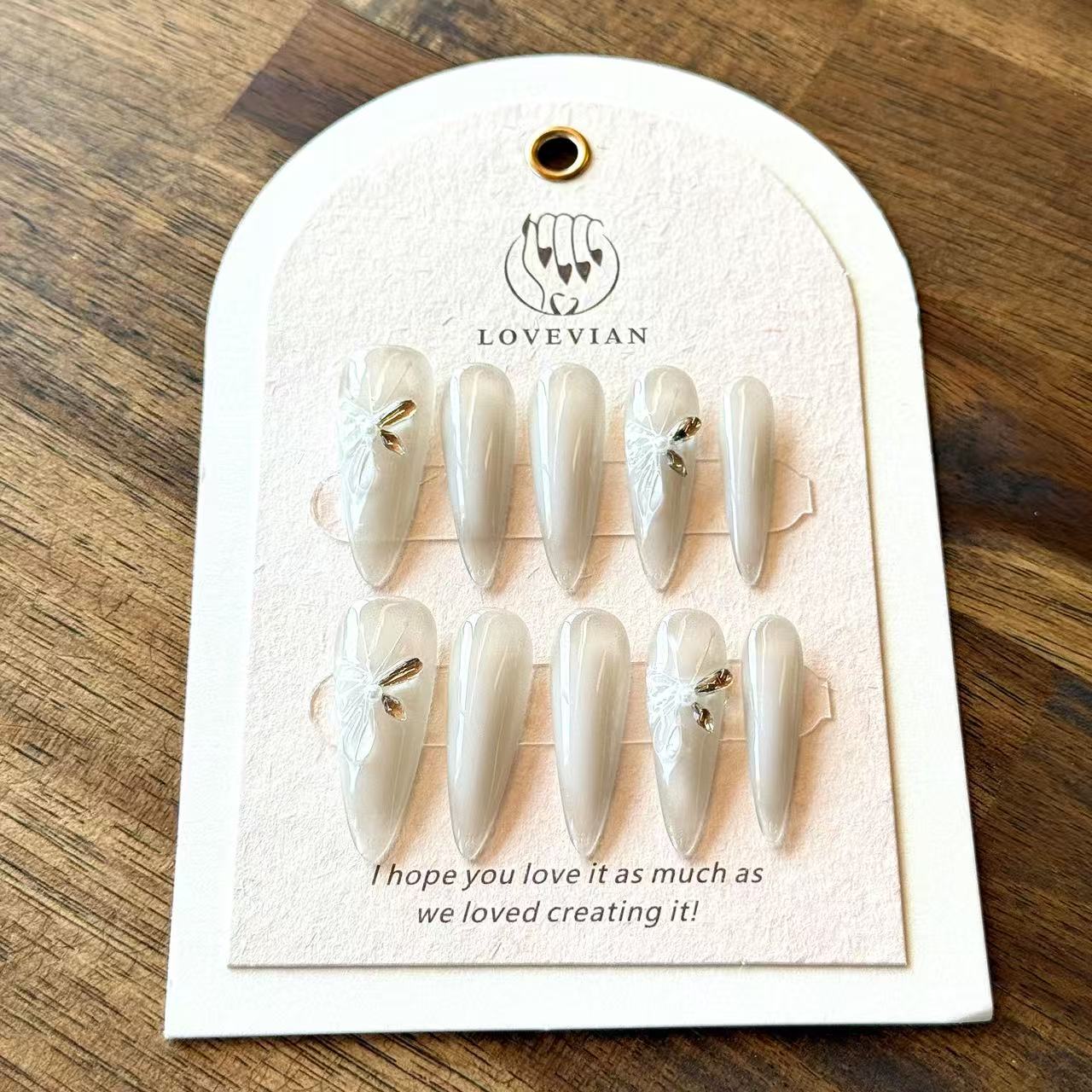 Ivory Lueur – Pearl Ombre Luxury Press-On Nails with 3D Bow & Golden Crystal Accent