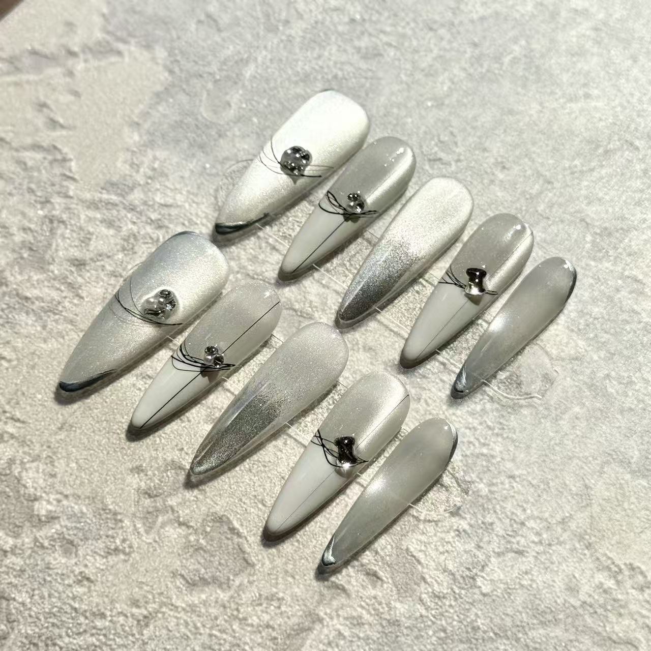 Glacier Shine – Stiletto Press-On Nails with Silver Cat-Eye, White Ombre & Crystal Accents