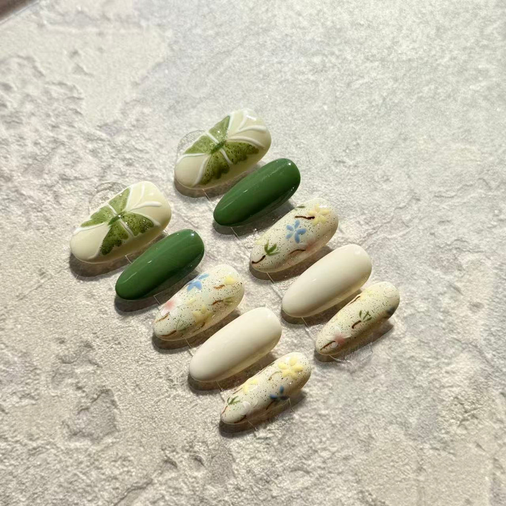 Spring Garden – Oval Press-On Nails with Green Clover, Floral Hand-Paint & Pastel Accents