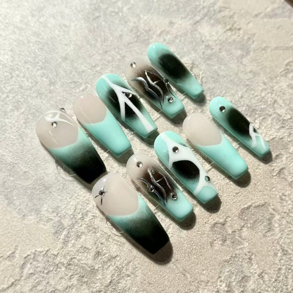 Mint Eclipse – Coffin Press-On Nails with Abstract Black Gradient, White Lines & Rhinestone Accents