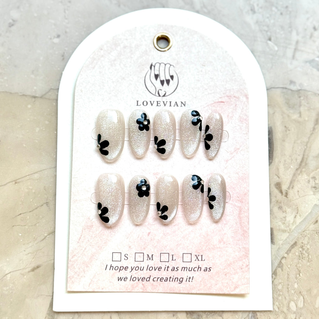 Noir Daisy – Silver Glitter Press-On Nails with Black Floral Design