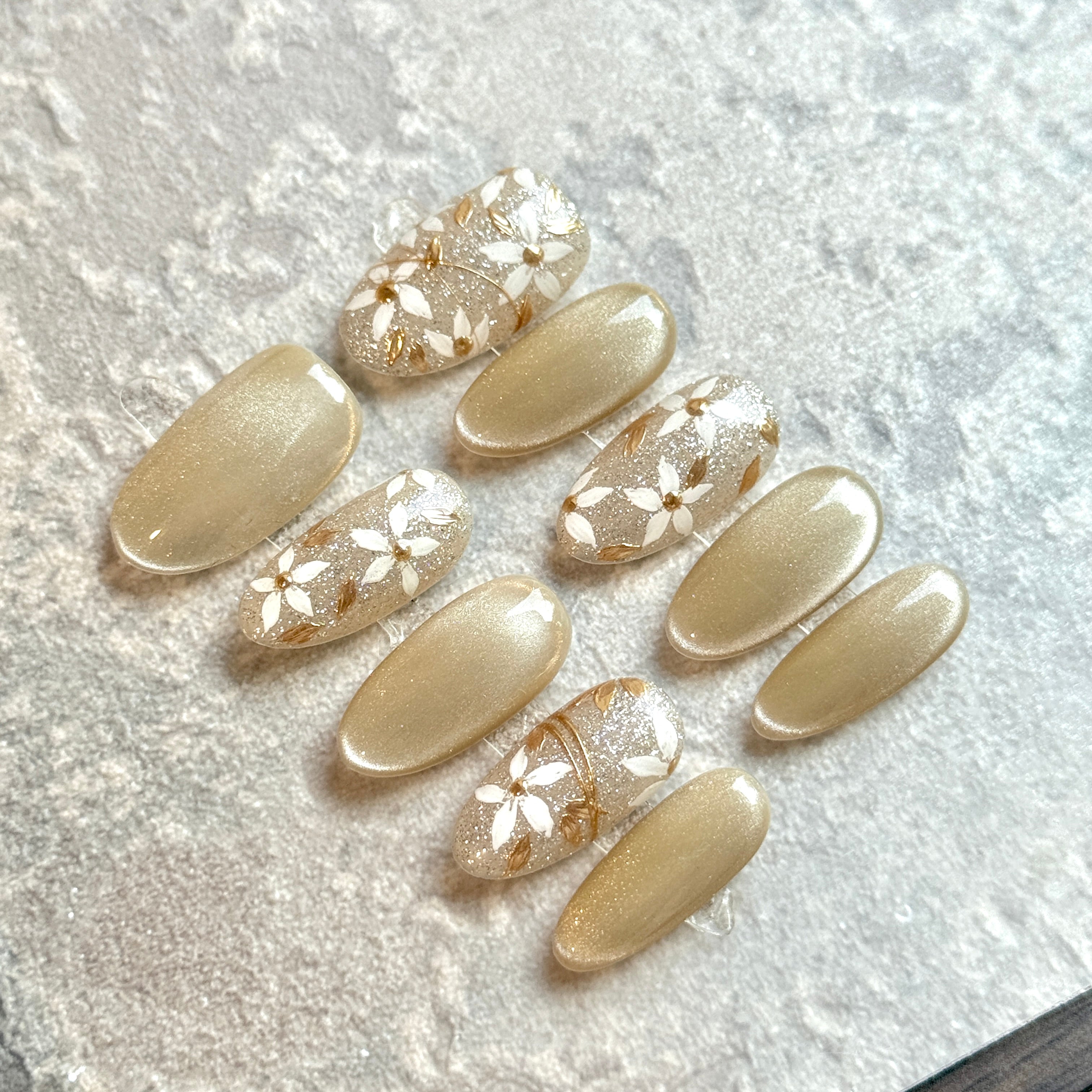 Golden Blossom Veil – Champagne Floral Press-On Nails with Gold Foil Accents