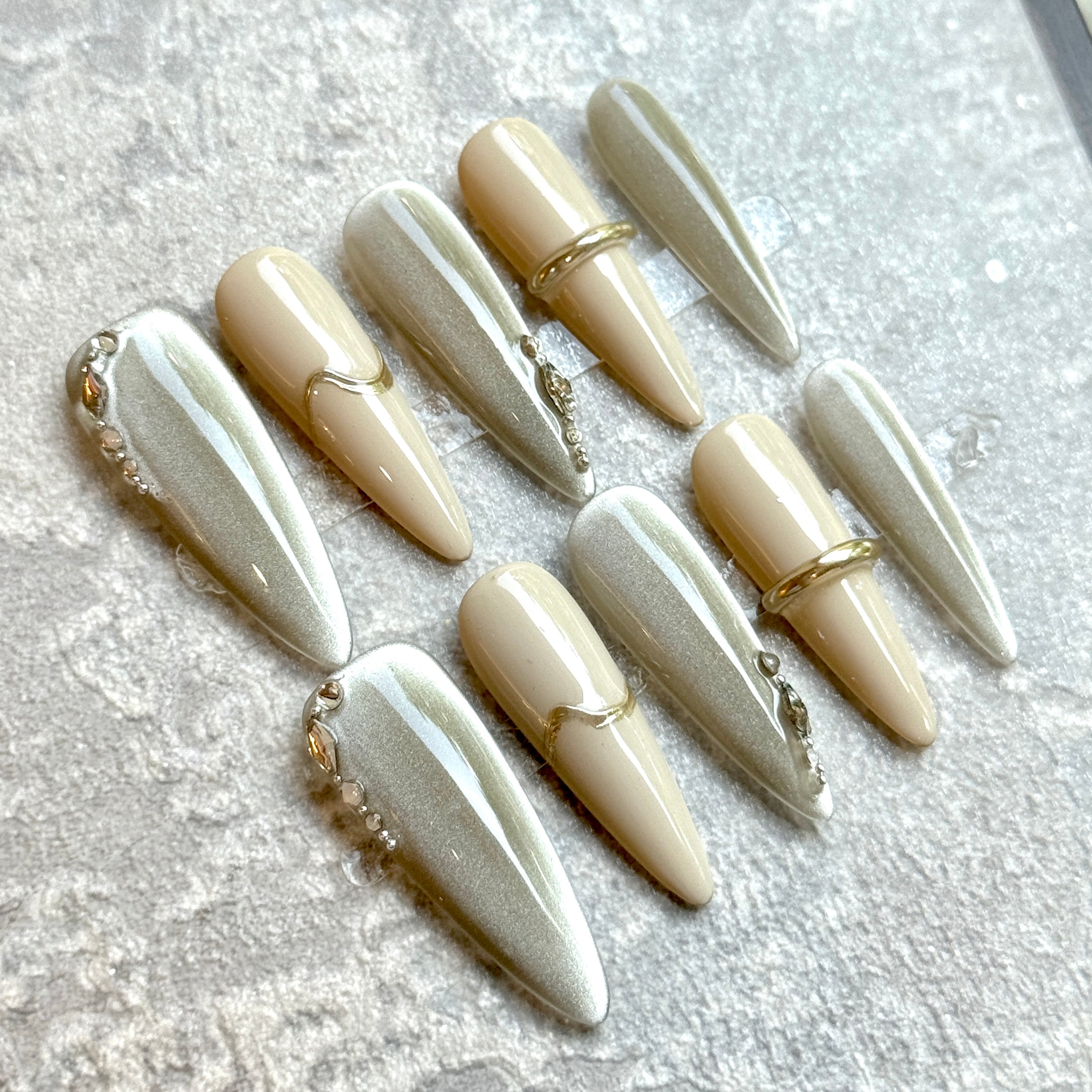 Champagne Moonlight – Silver & Nude Luxury Press-On Nails with Gold Wave and Crystal Accents
