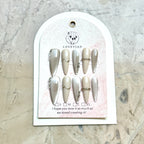 Champagne Moonlight – Silver & Nude Luxury Press-On Nails with Gold Wave and Crystal Accents