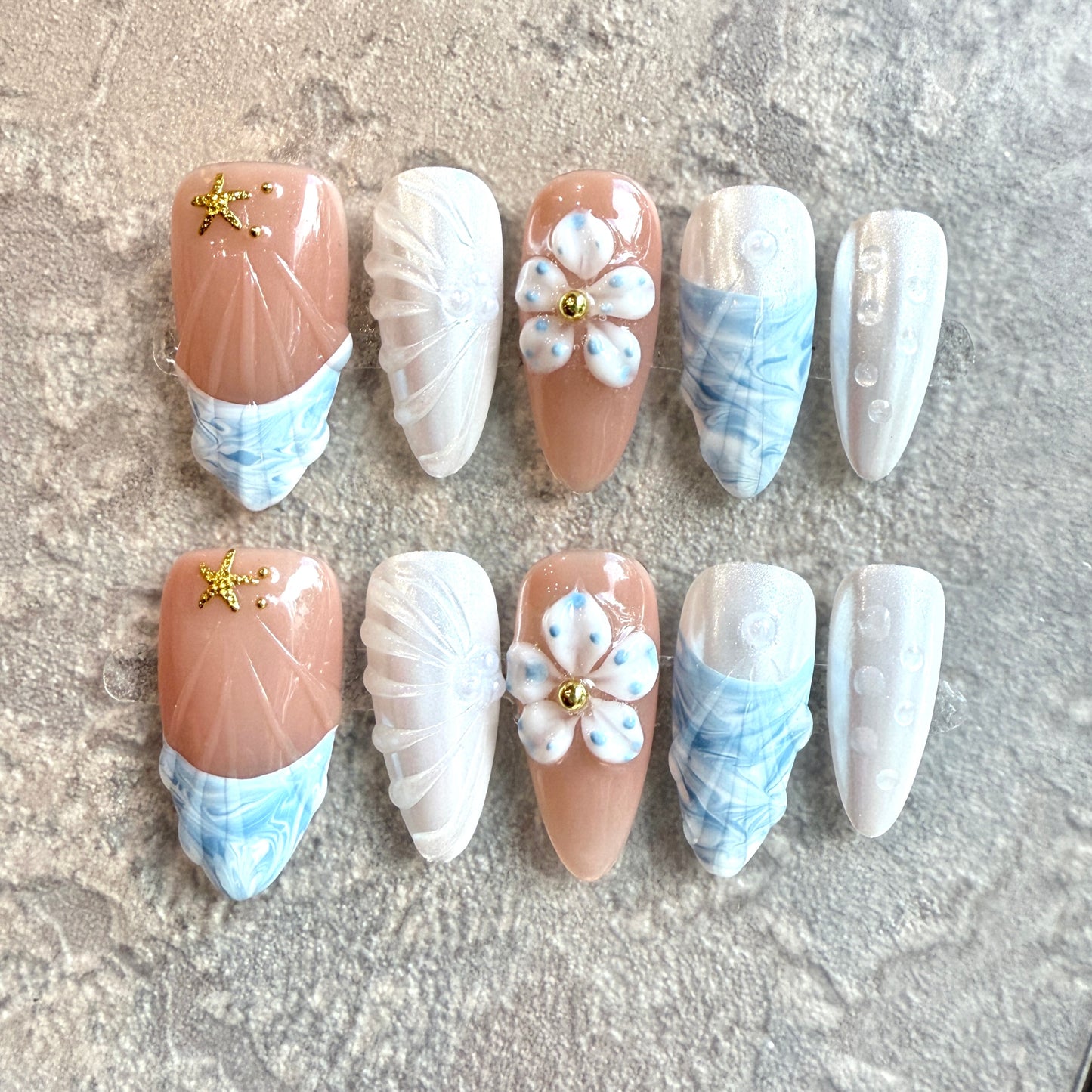Ocean Breeze – Coastal Nude & Blue Marble Press-On Nails with 3D Flowers and Starfish Accents