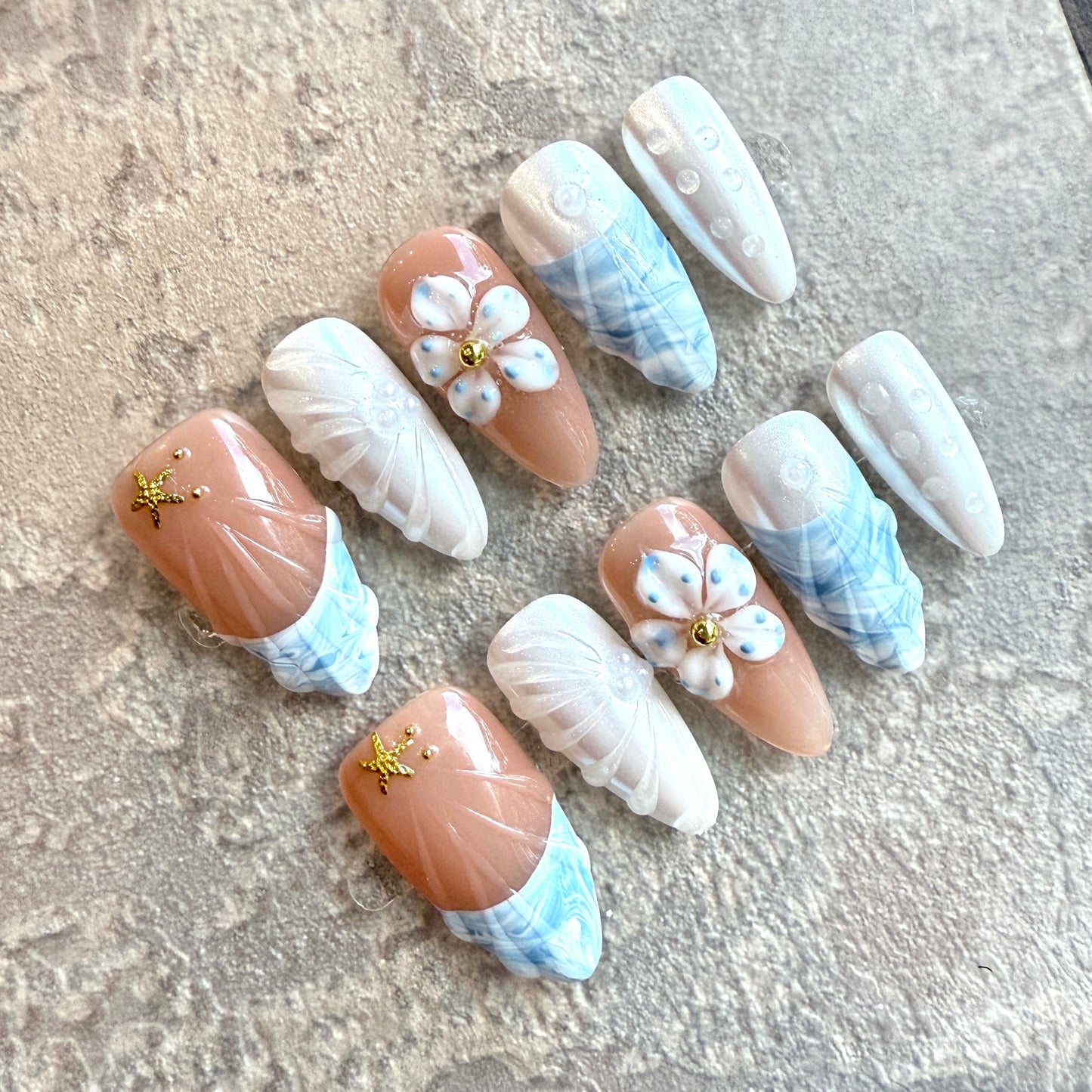Ocean Breeze – Coastal Nude & Blue Marble Press-On Nails with 3D Flowers and Starfish Accents