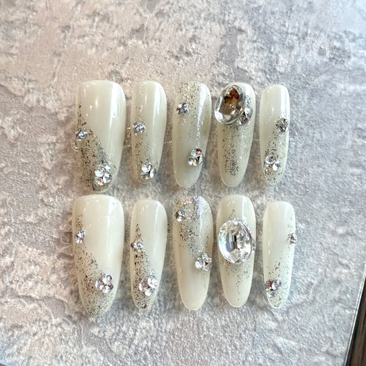 Crystal Glam Press-On Nails – Coffin Shape, White Nude Base with Silver Glitter & 3D Rhinestones