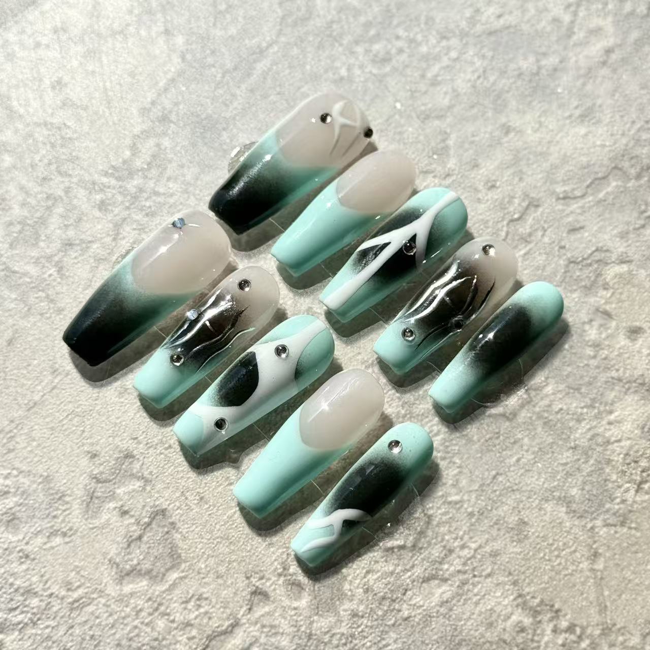 Mint Eclipse – Coffin Press-On Nails with Abstract Black Gradient, White Lines & Rhinestone Accents