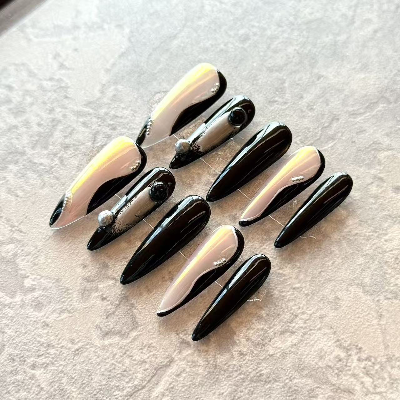 Noir Éclipse – Black & Nude Luxury Press-On Nails with Metallic Orbs