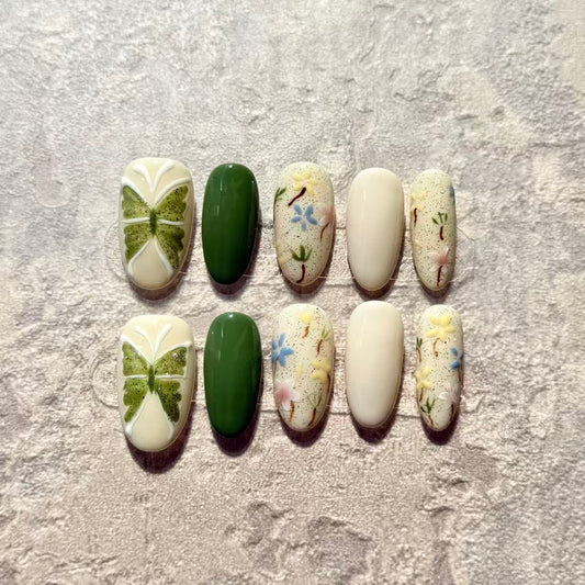 Spring Garden – Oval Press-On Nails with Green Clover, Floral Hand-Paint & Pastel Accents