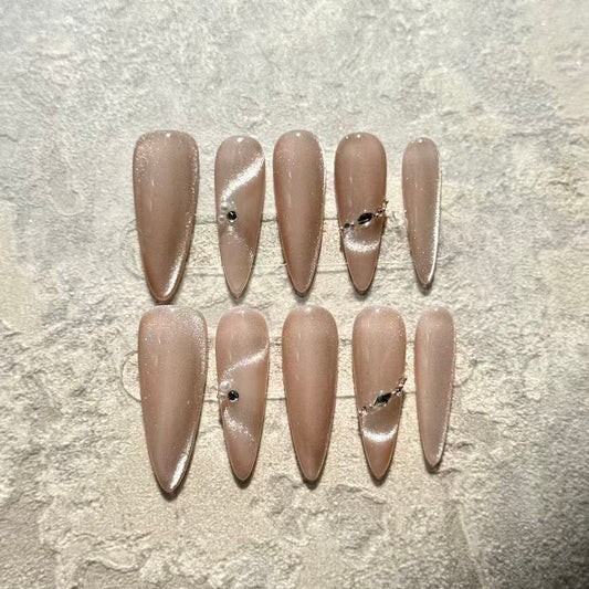Pearl Nude Elegance – Stiletto Press-On Nails with Nude Cat-Eye Shine & Minimalist Gem Accents