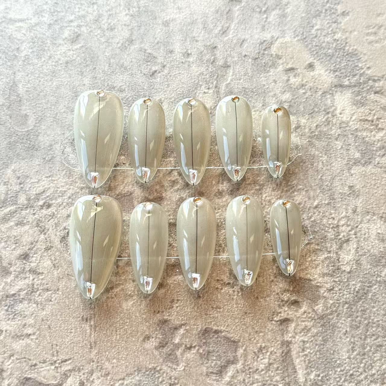 Gris Élégant – Nude Grey Luxury Press-On Nails with Minimalist Crystal Accent – Almond Shape